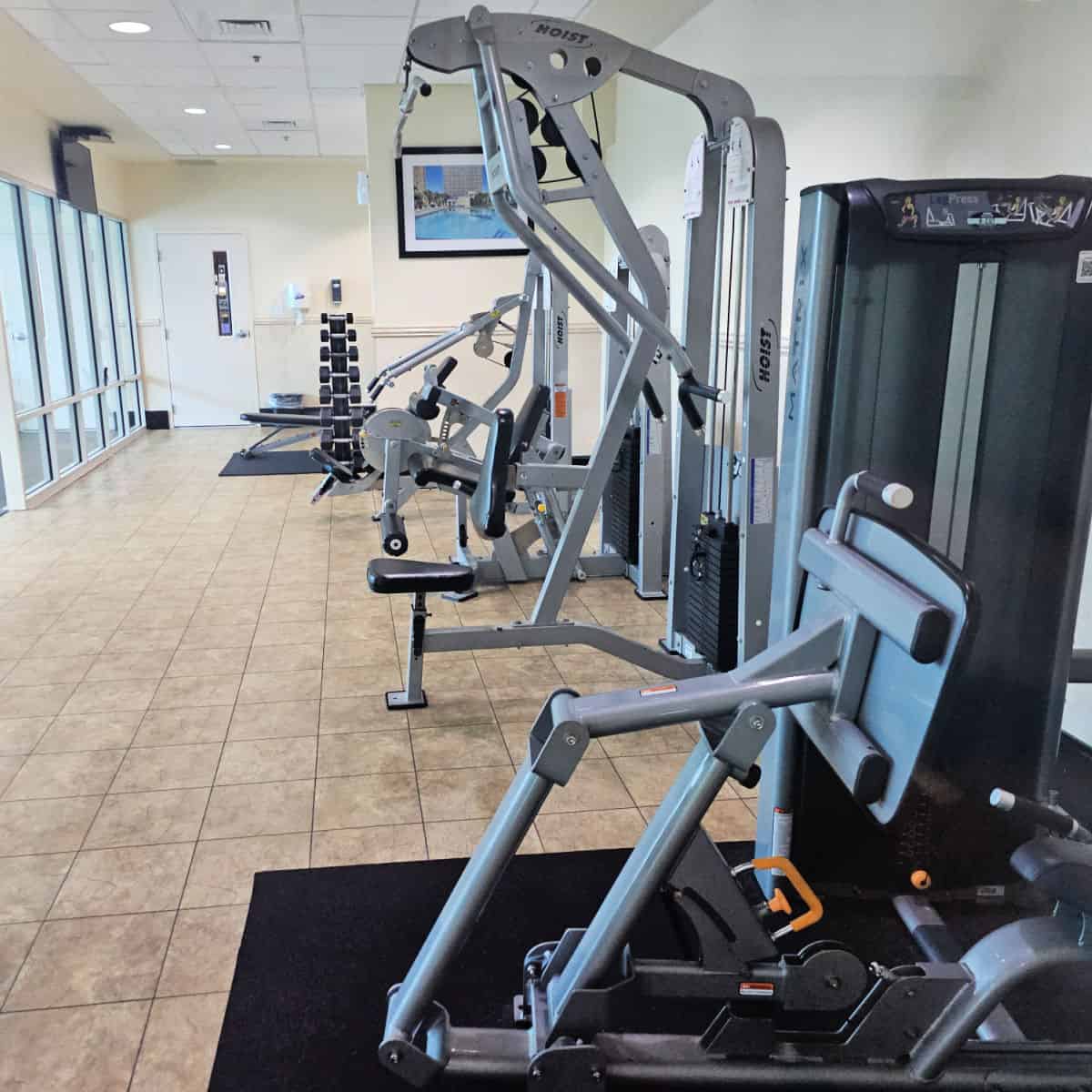 fitness center with free weights and weight machines