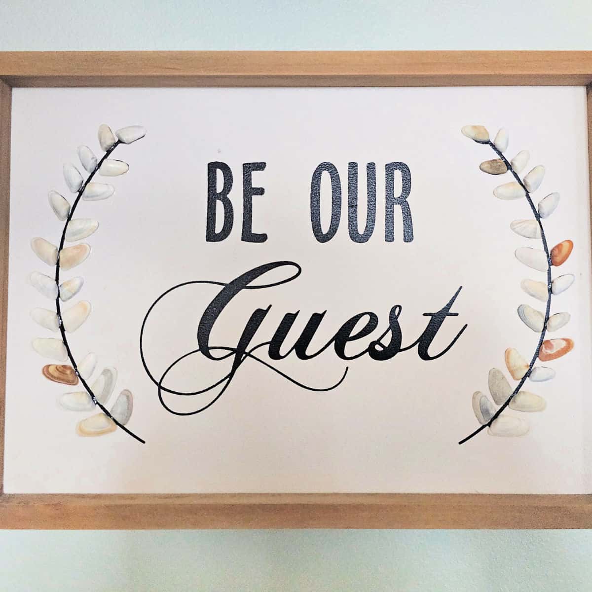 Be our Guest sign with shell art