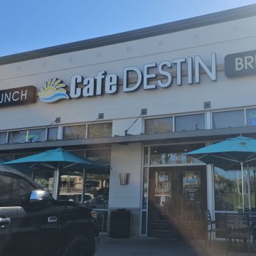 Cafe Destin sign with lunch and brunch over the entrance doors