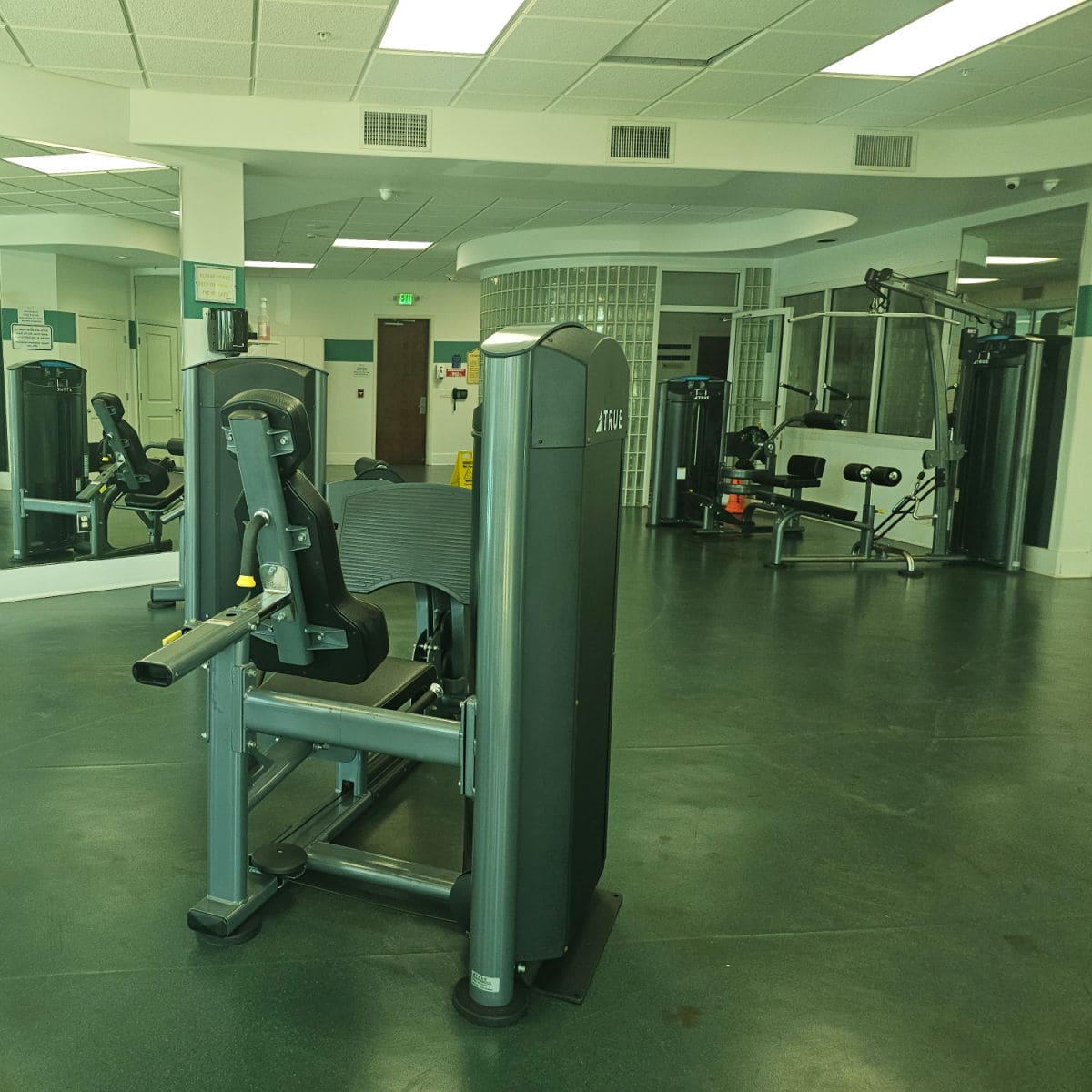 fitness center with weight machines and exercize equipment