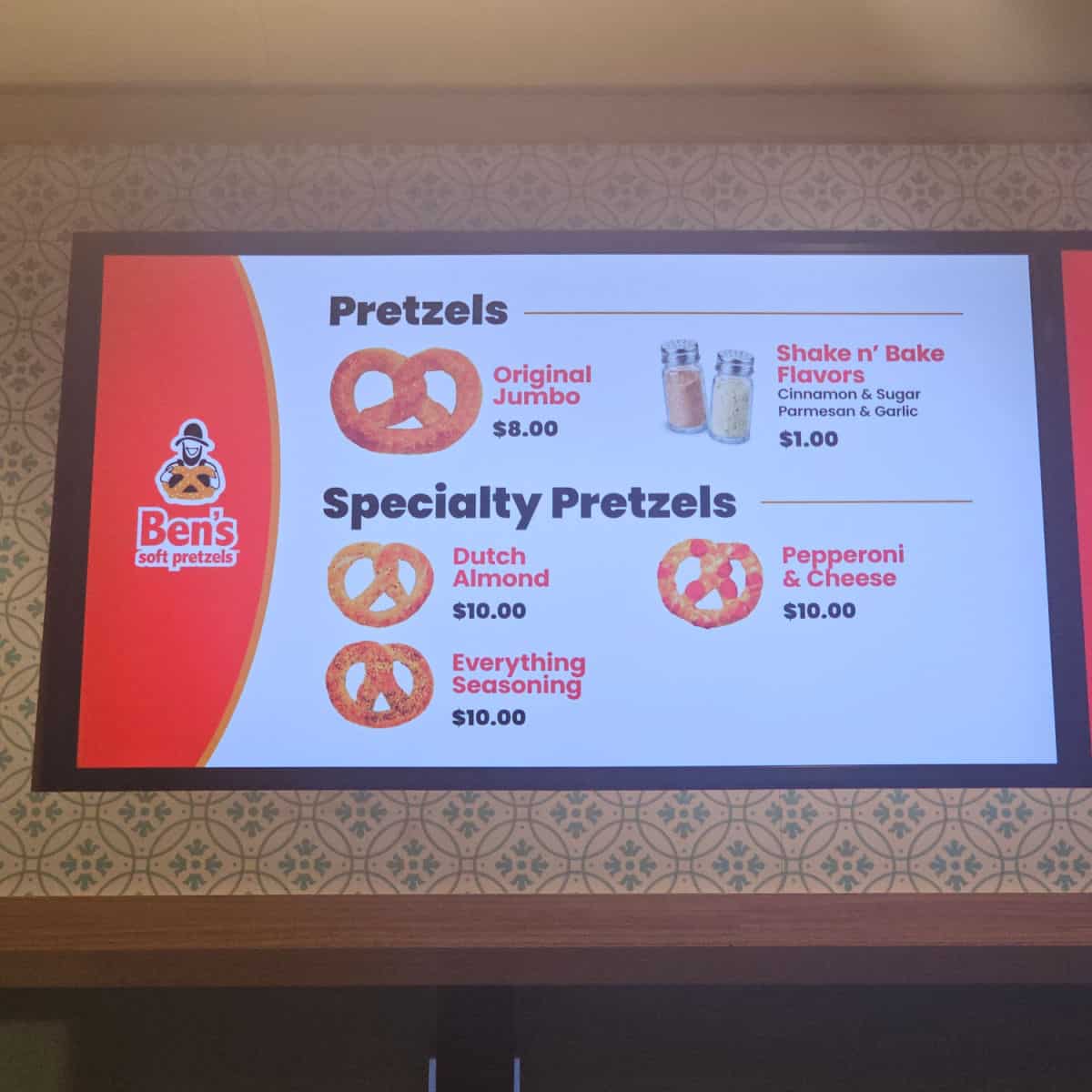 Ben's Soft Pretzels menu sign with pretzels, specialty pretzels, and shake n bake flavors