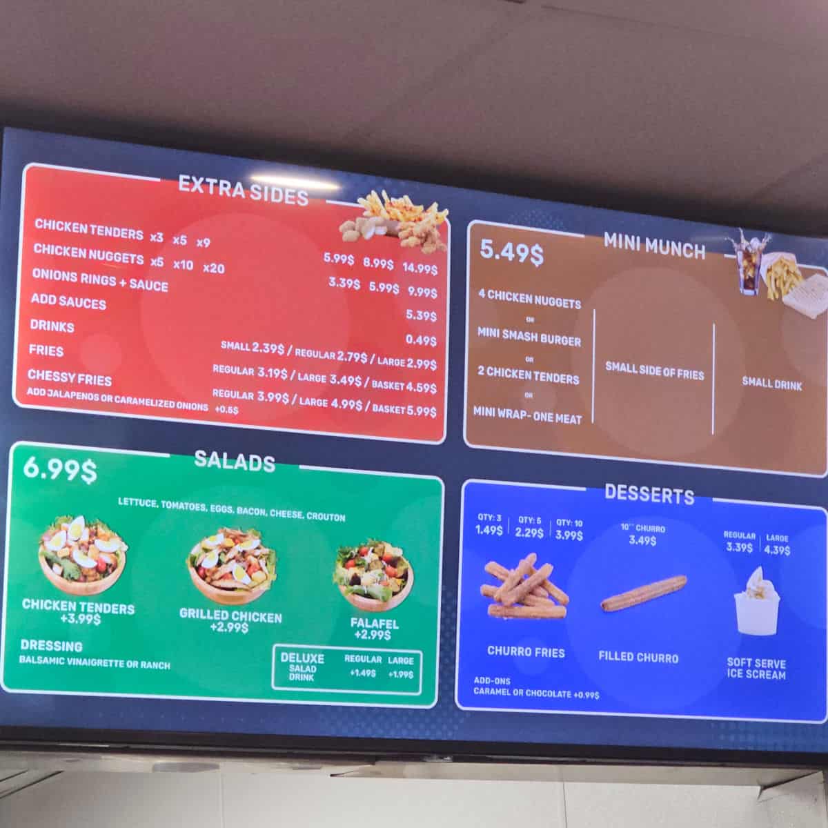 Fries Inside menu with extra sides, salads, desserts, and mini munch items