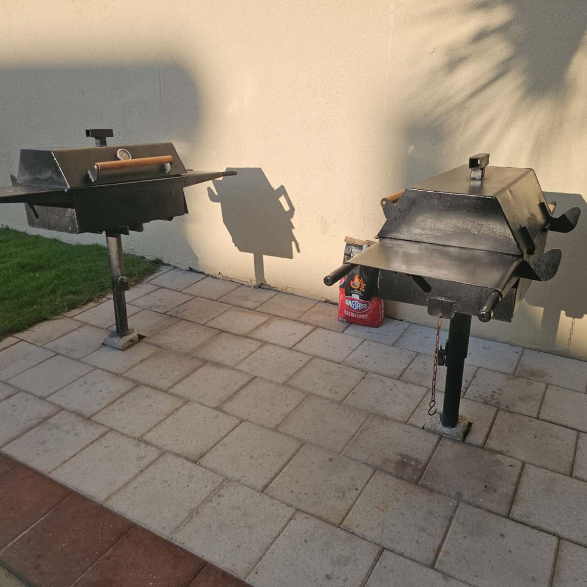 bbq area with two charcoal grills