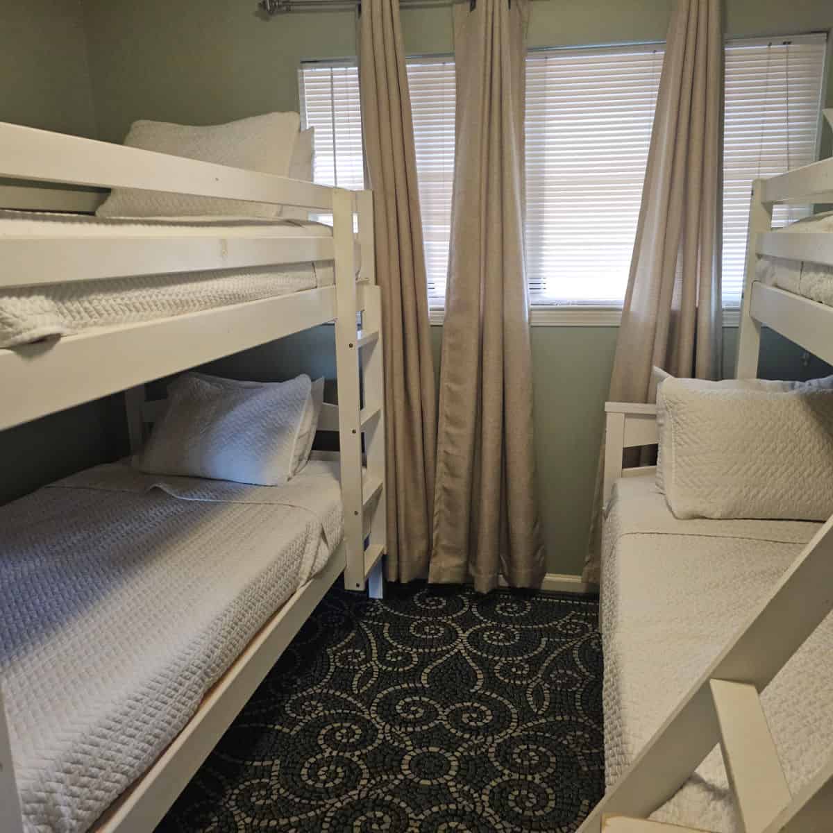 Bedroom with bunk beds on either side of the room