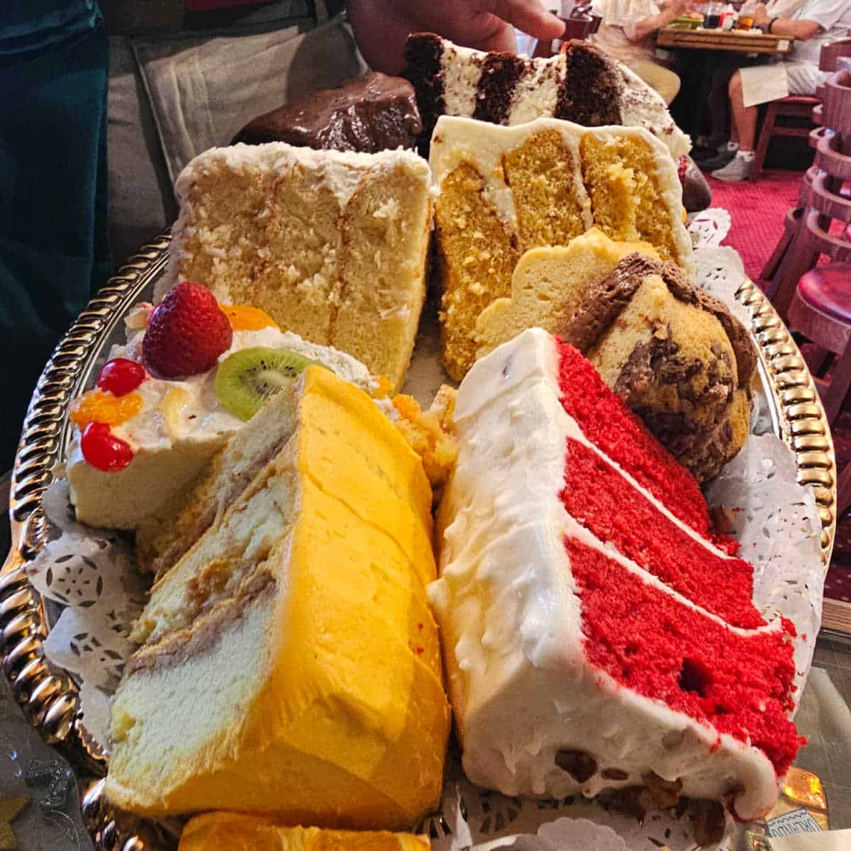 platter with large slices of Bubble Room cake on them