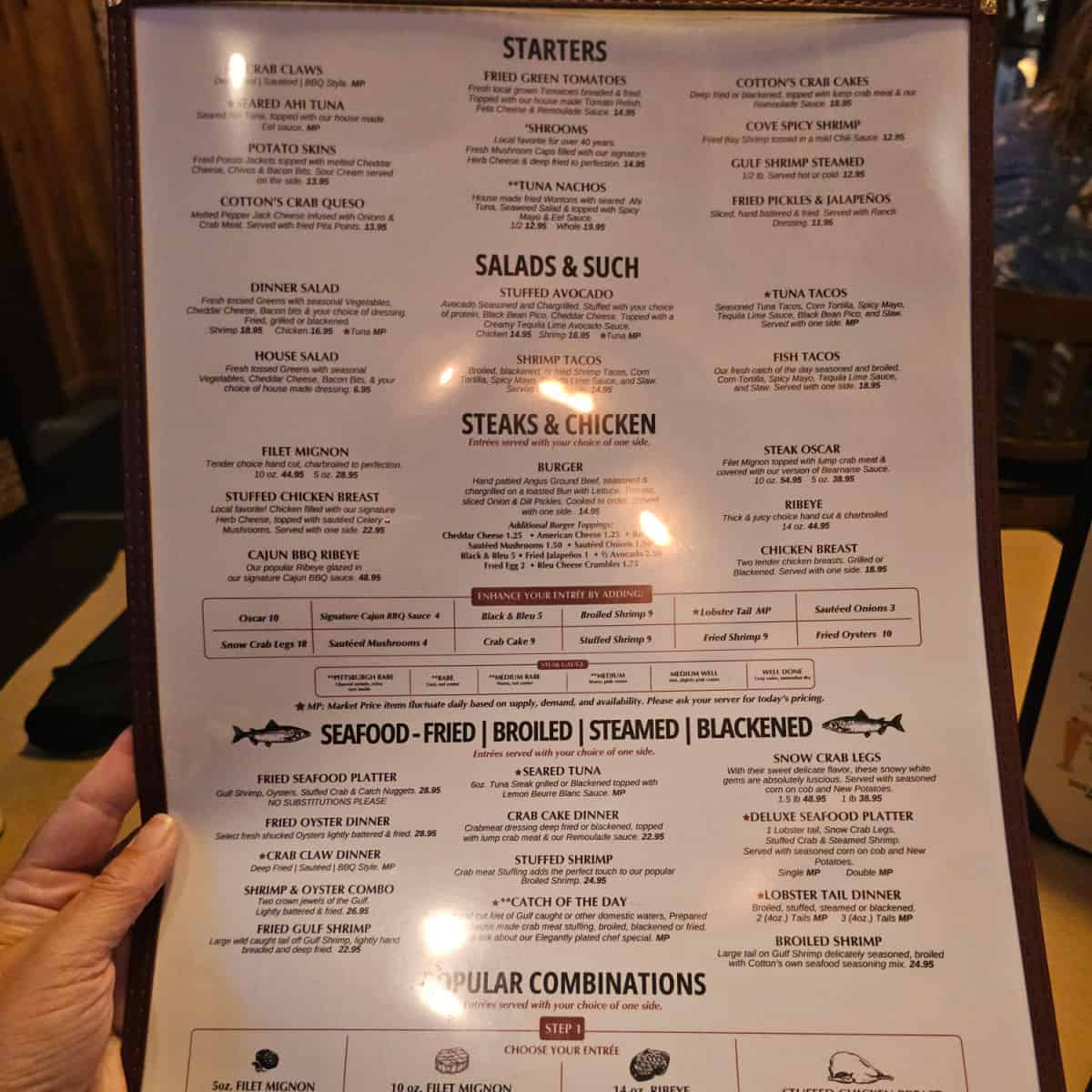 Cotton's Restaurant menu with starters salads steak and chicken and seafood listed on it