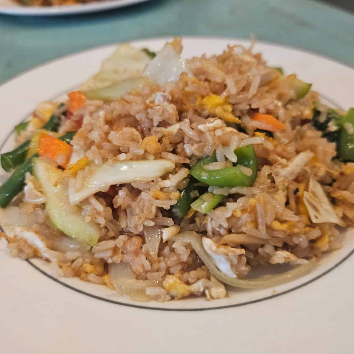 veggie rice on a white plate