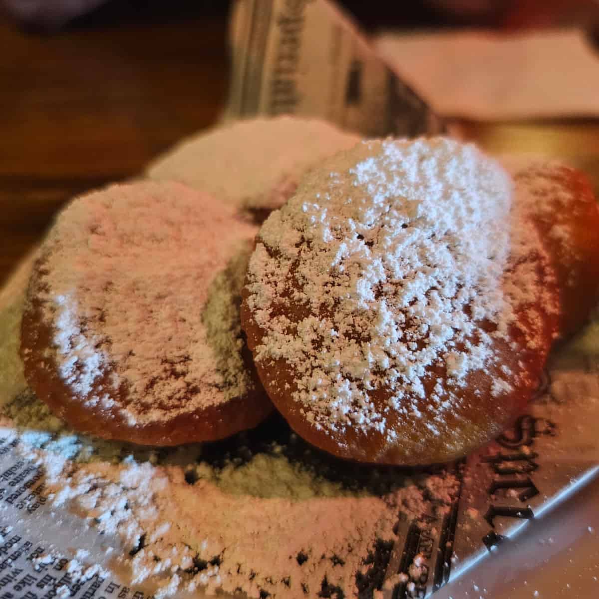 beignets covered in powdered sugar
