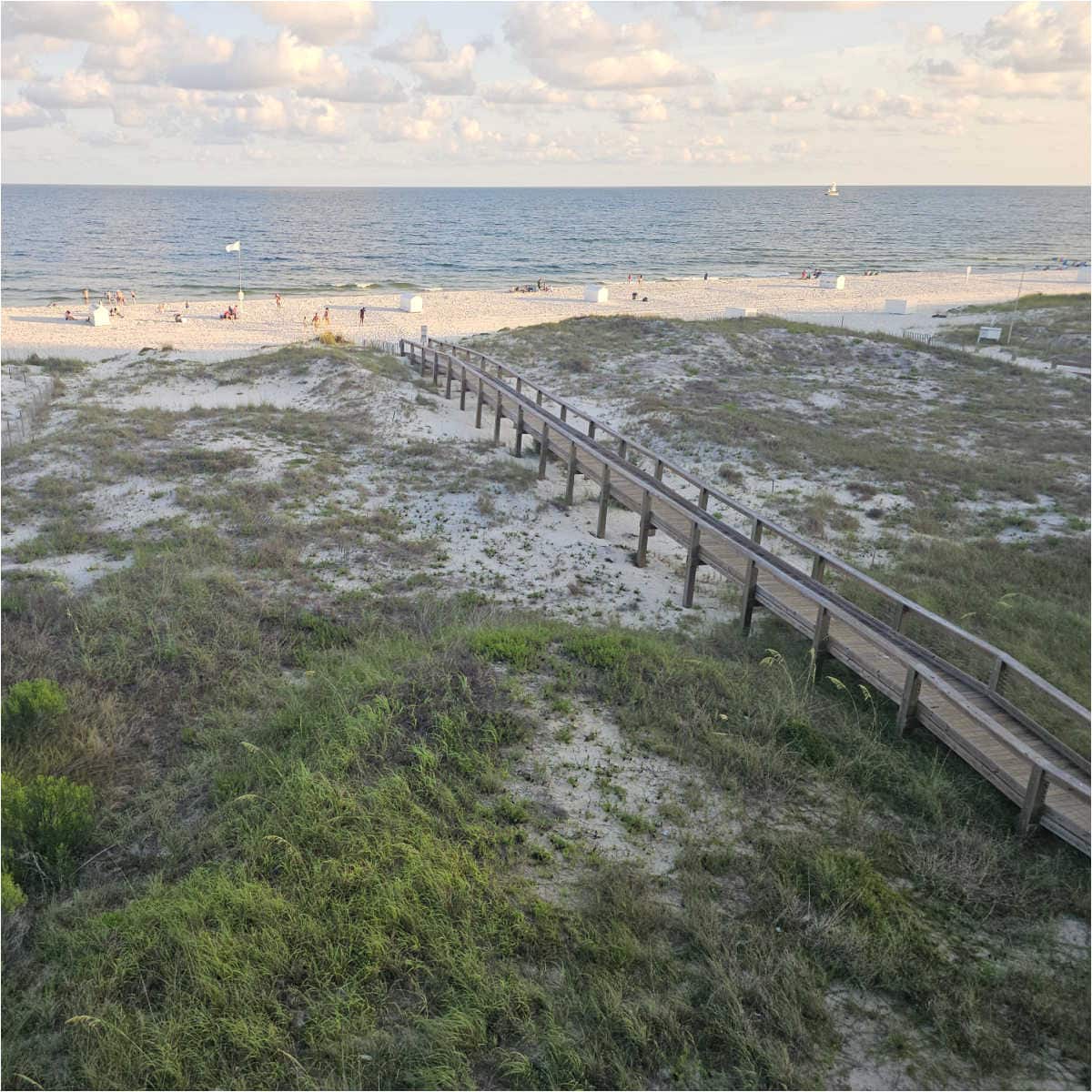 elevated boardwalk over the sand dunes to the beach