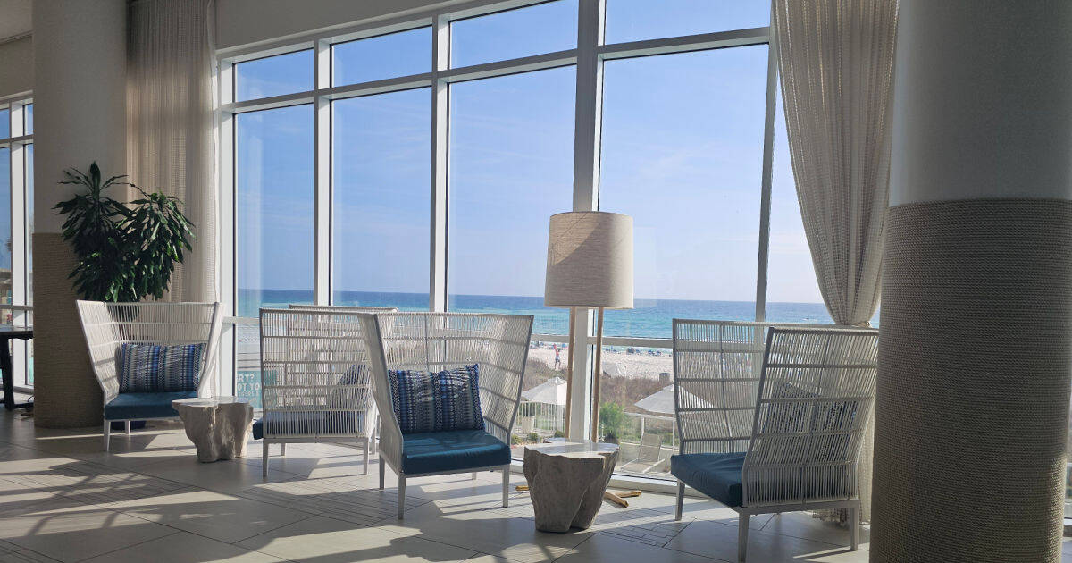 lobby area with chairs and gorgeous Gulf views