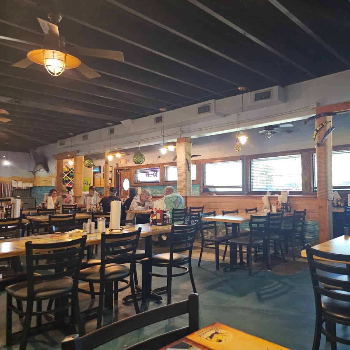 indoor seating with tables and chairs