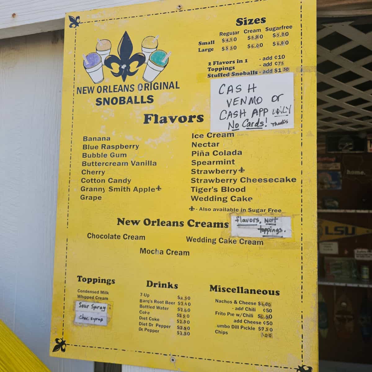 New Orleans Original Snoballs menu with sizes, flavors, creams, and toppings