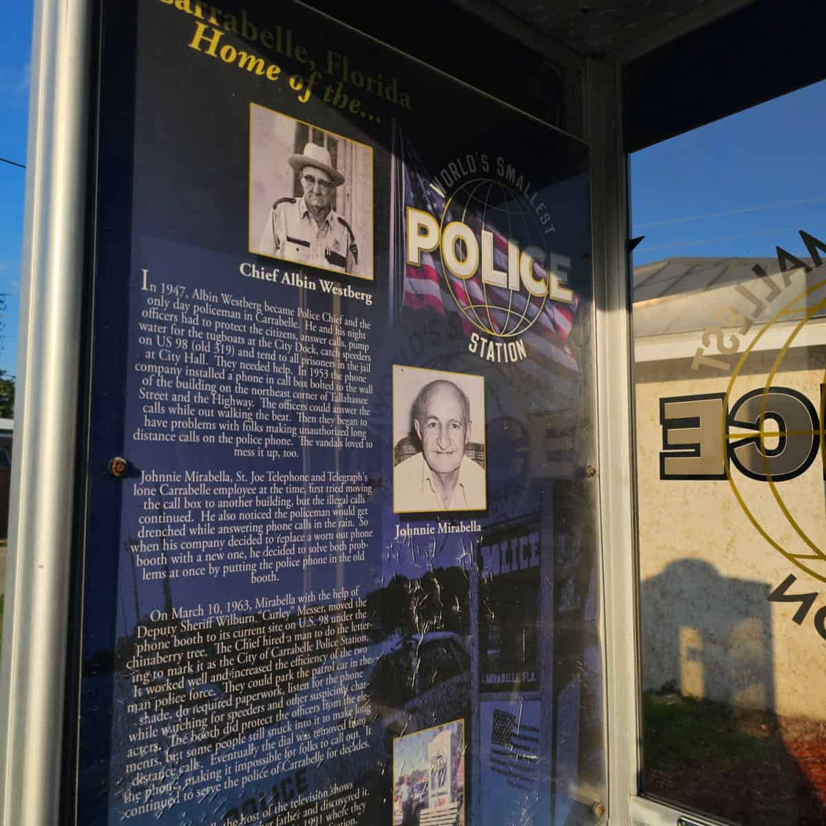 Carrabelle Florida Home of the World's Smallest Police Station information inside a phone booth