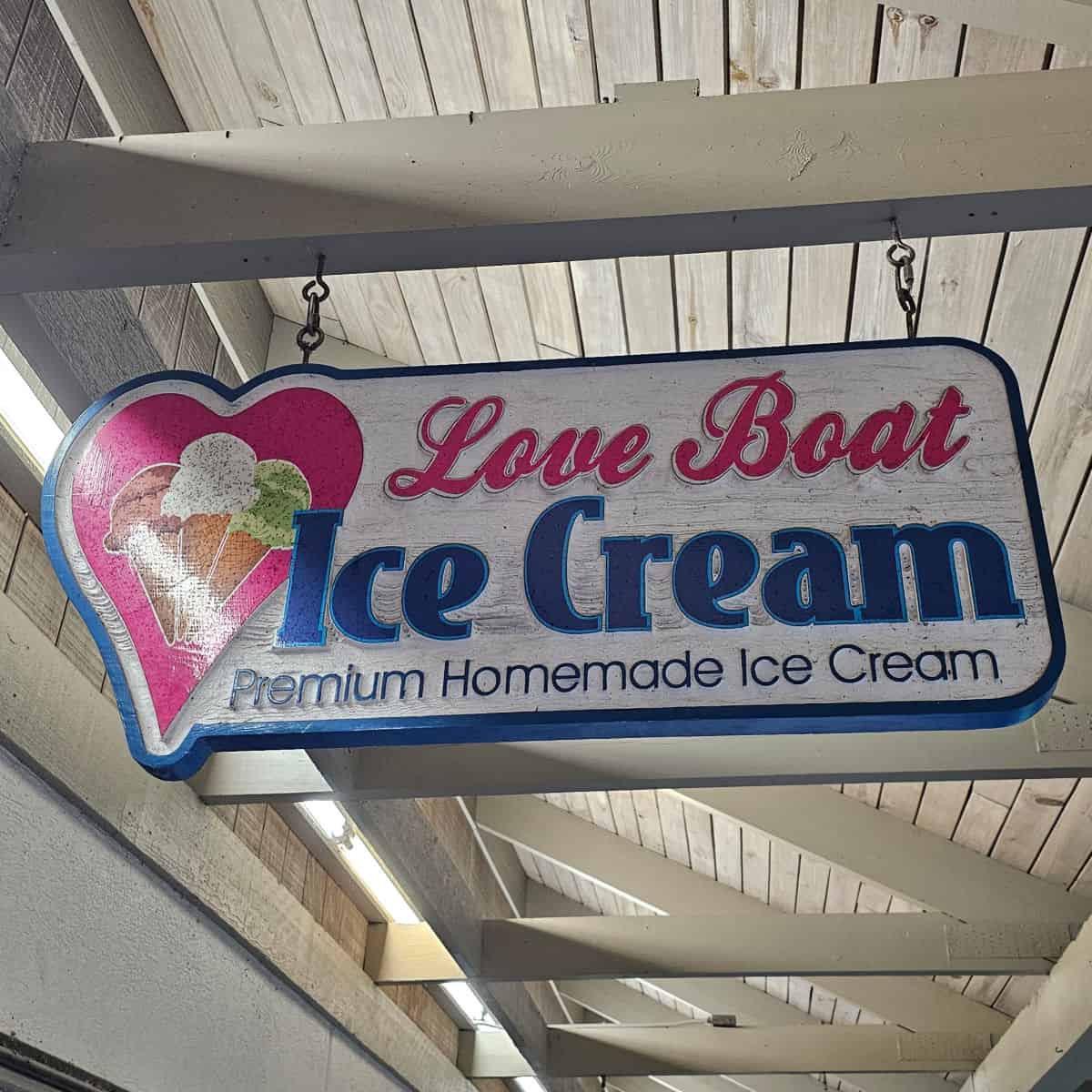 Love Boat Ice Cream Premium Homemade Ice Cream sign with a heart and ice cream cones