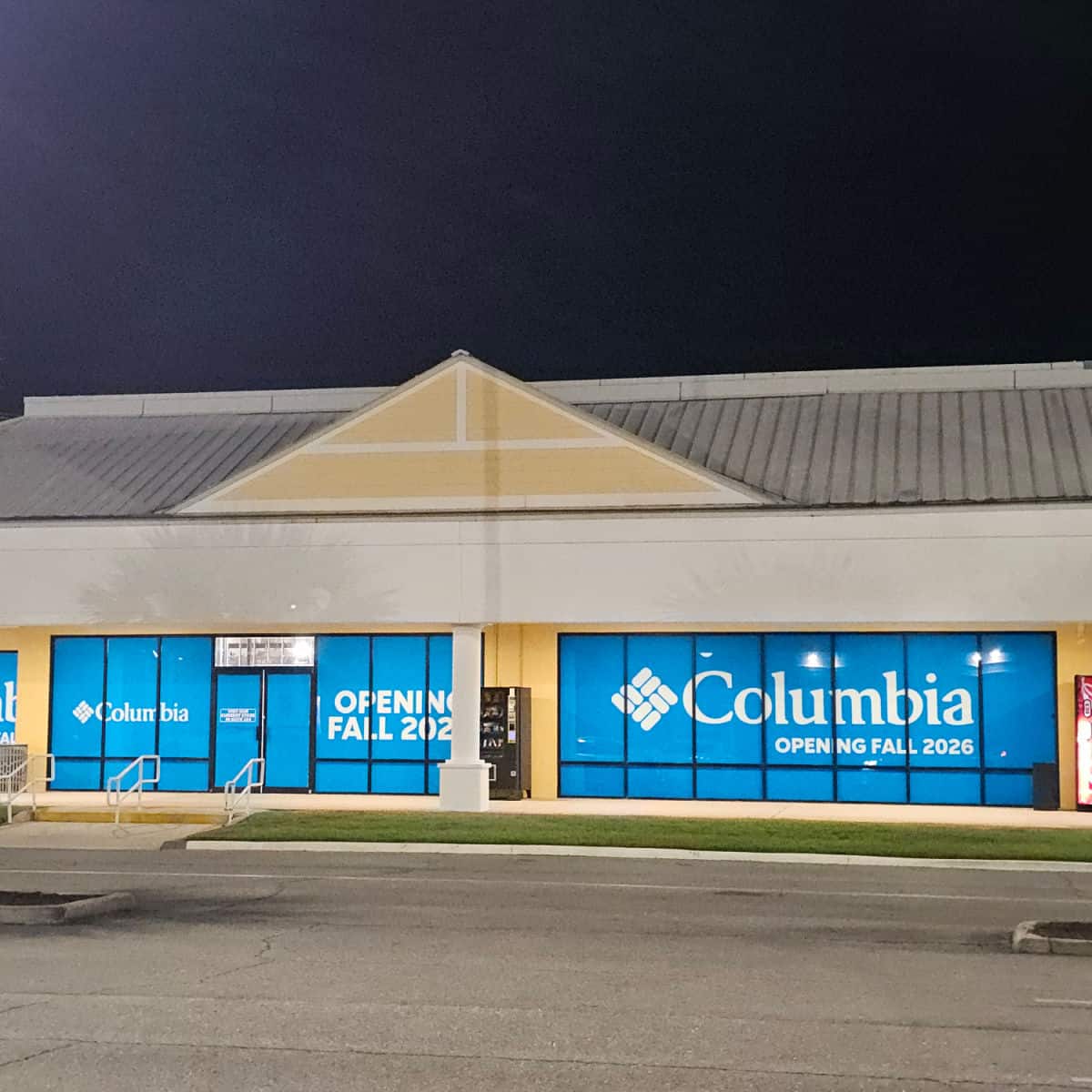 Columbia opening Fall 2026 sign covering the windows of a store