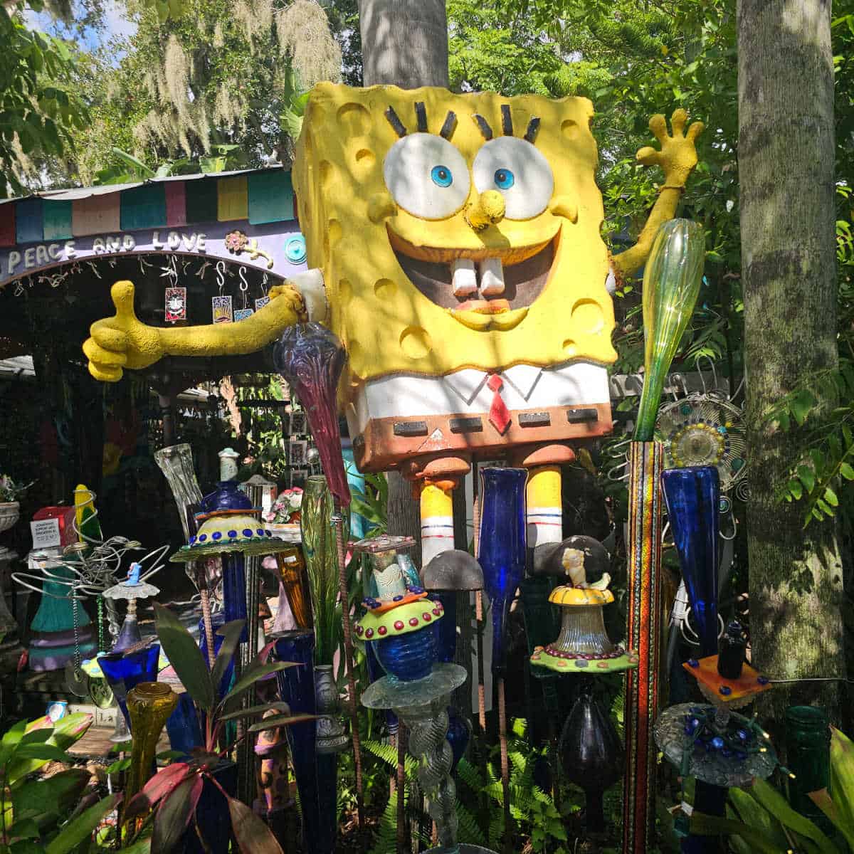 Spongebob Square Pants figurine surrounded by blue bottles