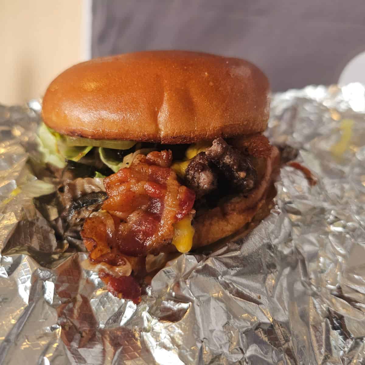 Bacon Cheeseburger on a foil wrap