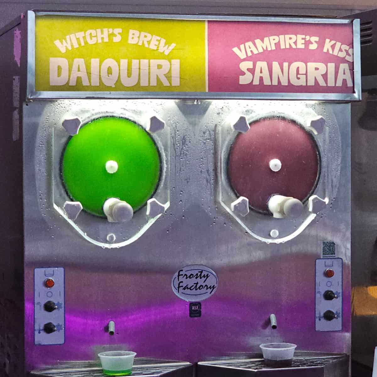 Witch's brew daiquiri and Vampire Kiss sangria in a frozen drink machine