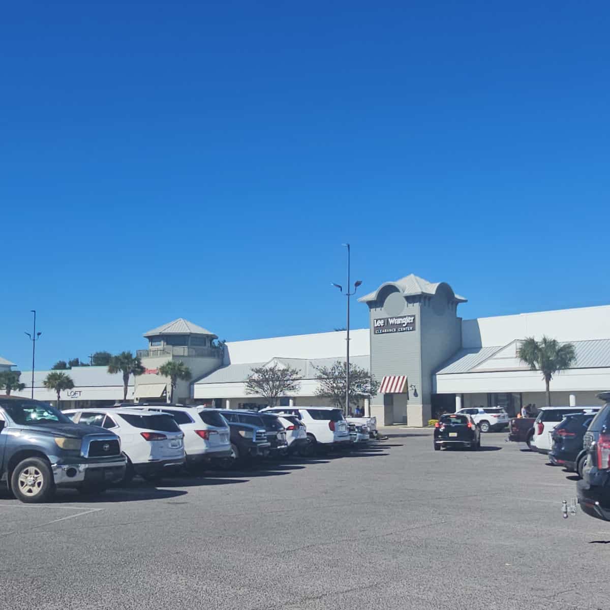 looking across the parking lot to Tanger Outlet stores