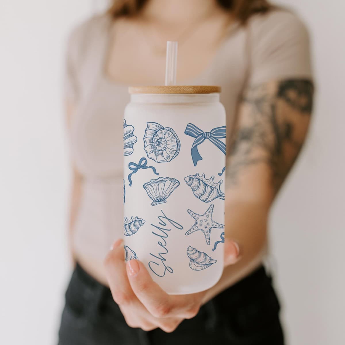 Personalized Shell Glass with blue shells and ribbons on it