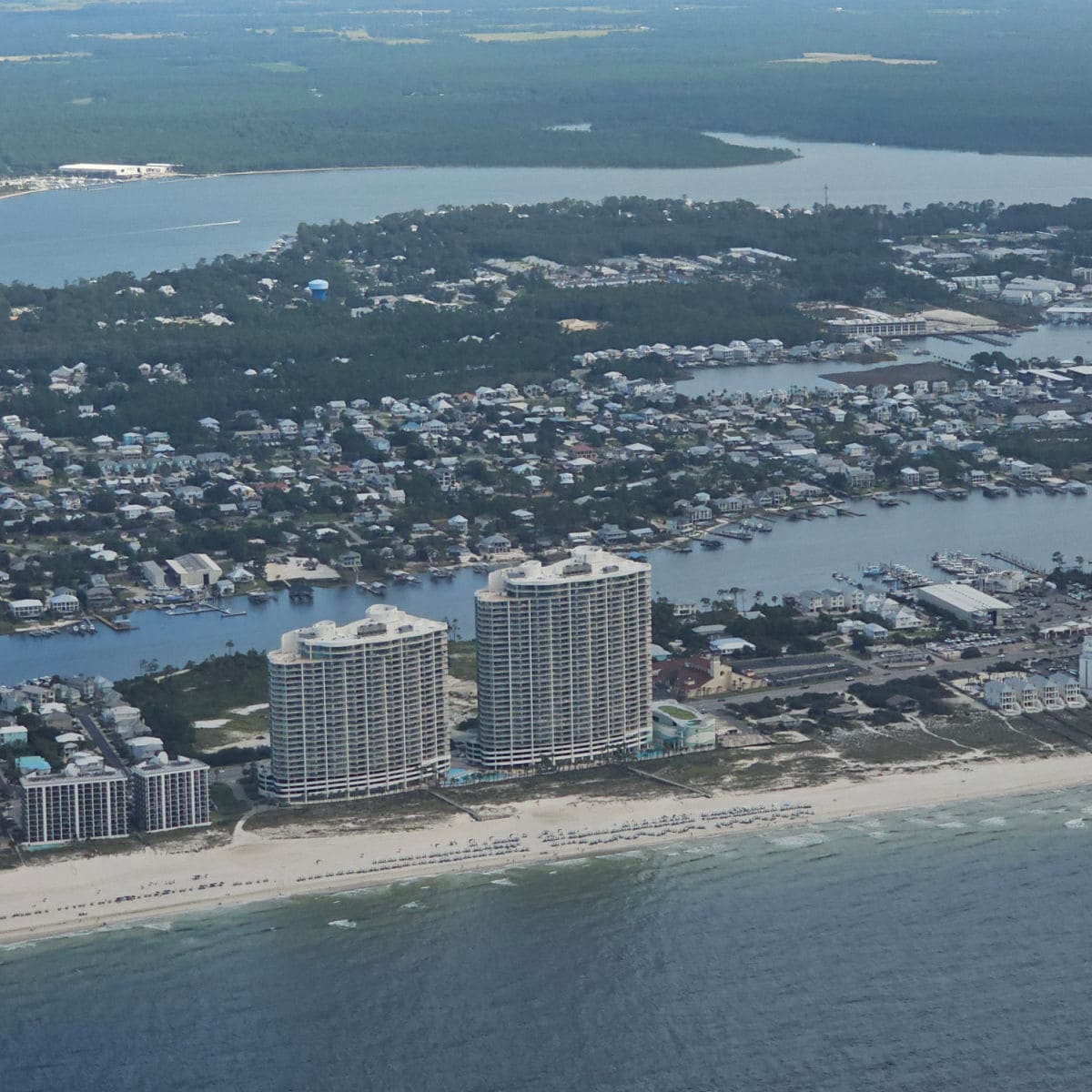 Turquoise Place and Orange Beach seen from the air with the beach