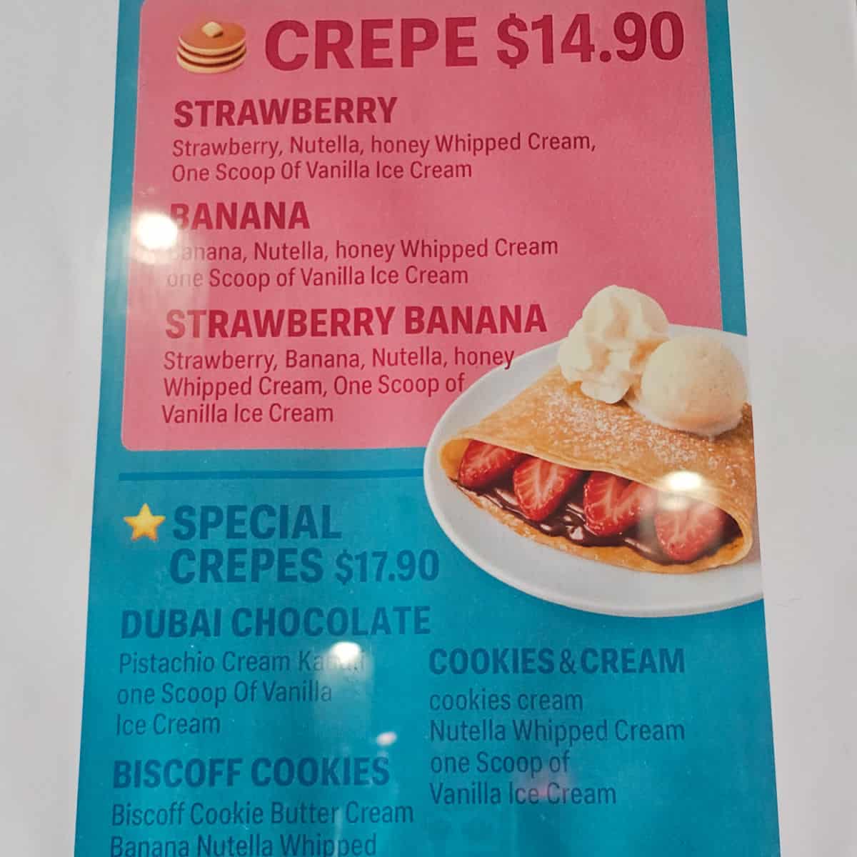 Crepe menu with a photo of a crepe on it