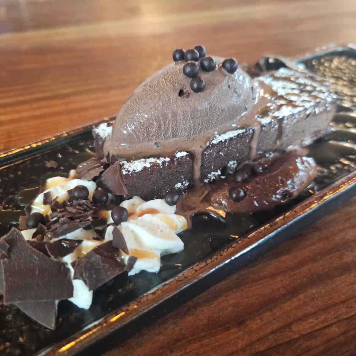 chocolate dessert with three types of chocolate on a tray