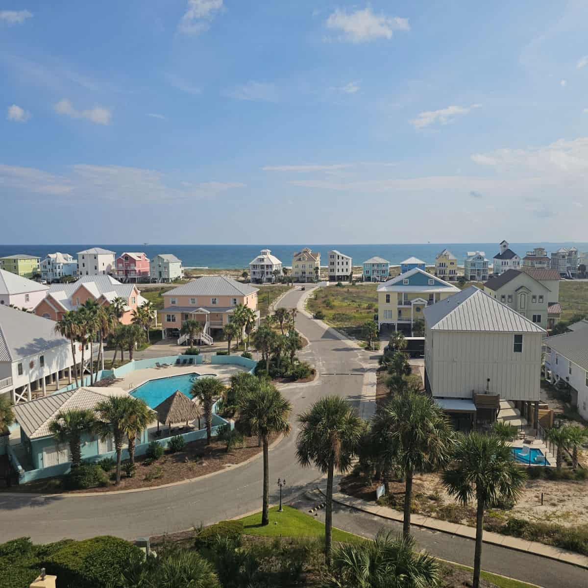 Looking out over colorful vacation houses towards the Gulf waters